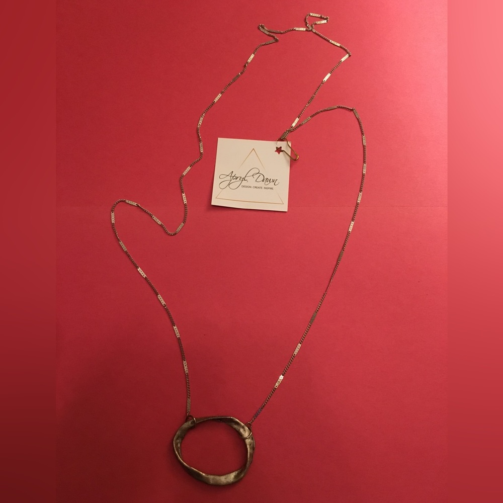 Apryl Dawn gorgeous gold chain with pendant.